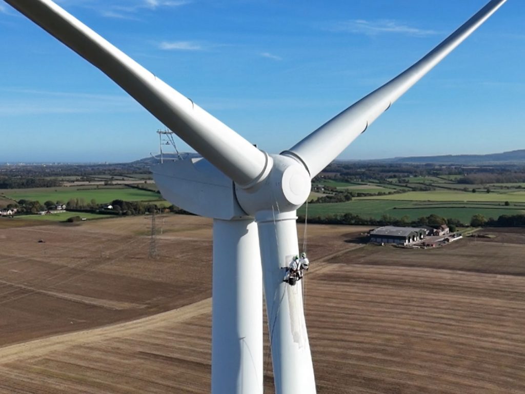 On-site wind turbine blade repair performed by rope access technicians